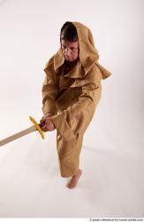 JOEL_ADAMSON STANDING POSE WITH SWORD